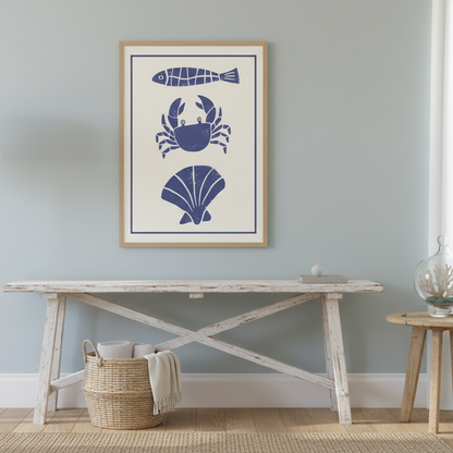 Nautical-themed artwork with a fish, crab, and shell on a white background