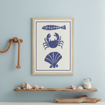 Framed artwork with blue crab, fish, and shell illustrations on a white background