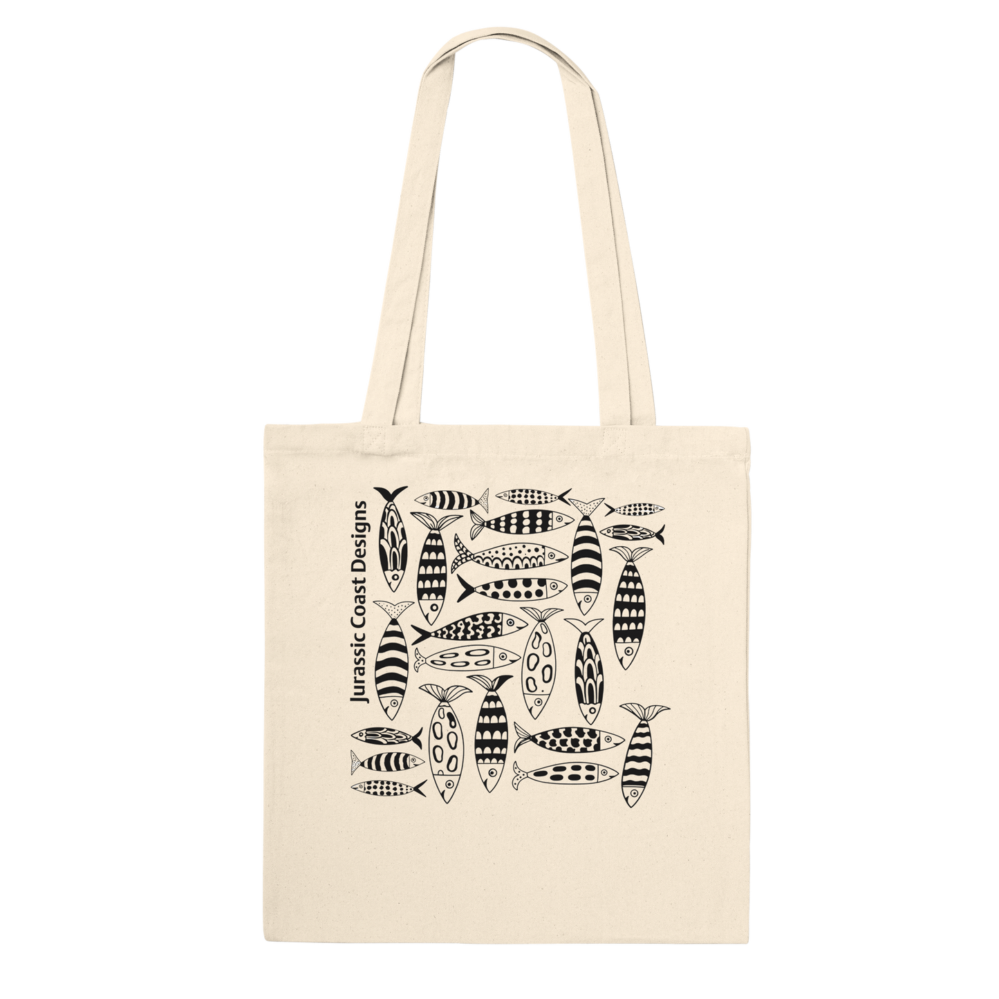 Beige tote bag with black fish pattern and 'Jurassic Coast Designs' text on a white background