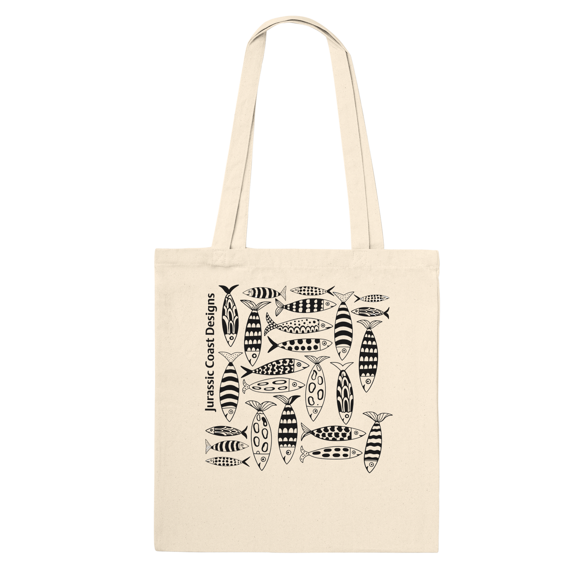 Beige tote bag with black fish pattern and 'Jurassic Coast Designs' text on a white background