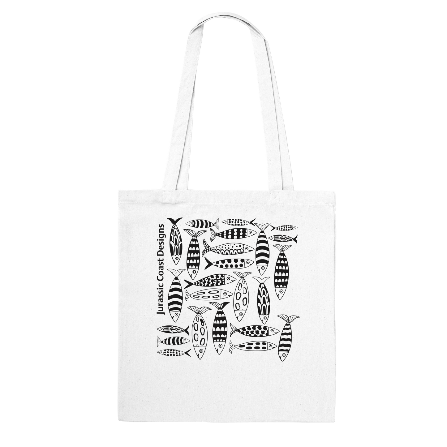 White tote bag with black fish pattern and 'Jurassic Coast Designs' text on a white background