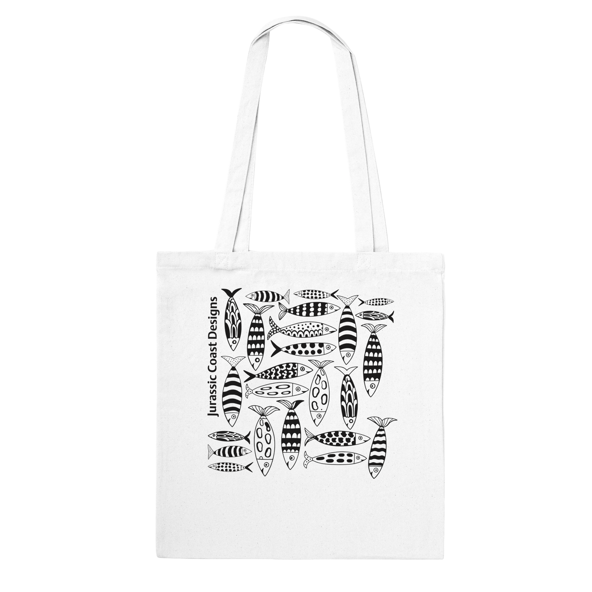White tote bag with black fish pattern and 'Jurassic Coast Designs' text on a white background