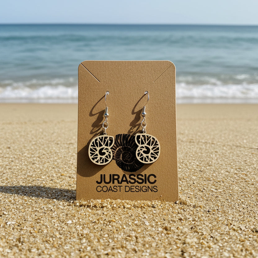 Ammonite fossil earrings on a 'Jurassic Coast Designs' card
