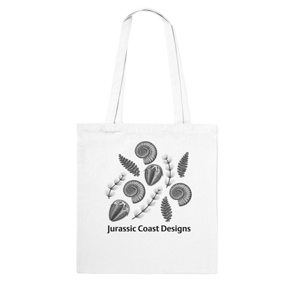 White tote bag with black floral design and 'Jurassic Coast Designs' text on a white background