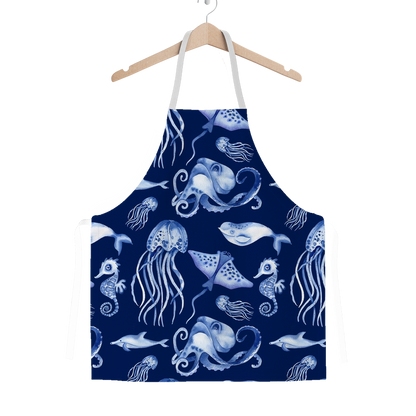 Navy blue apron with white sea creature pattern on a white background