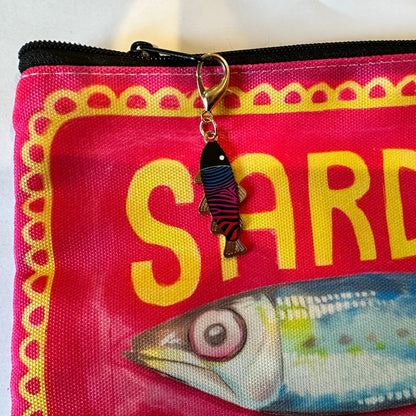 Pouch with 'SARDINE' text and fish design on a red background
